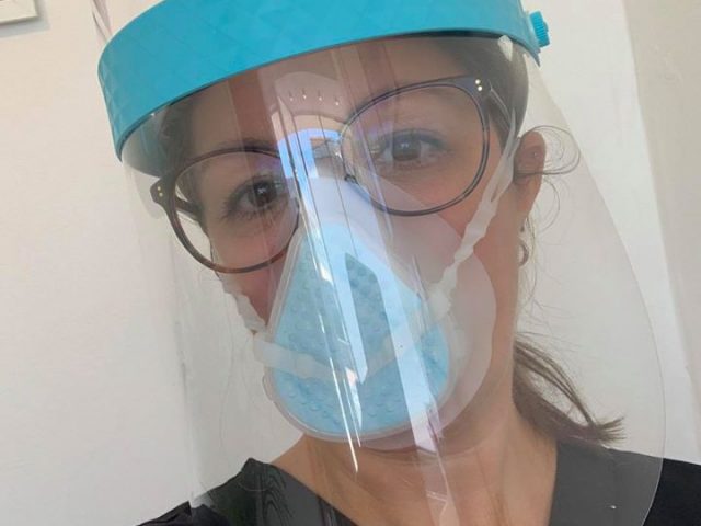 Caroline in PPE gear